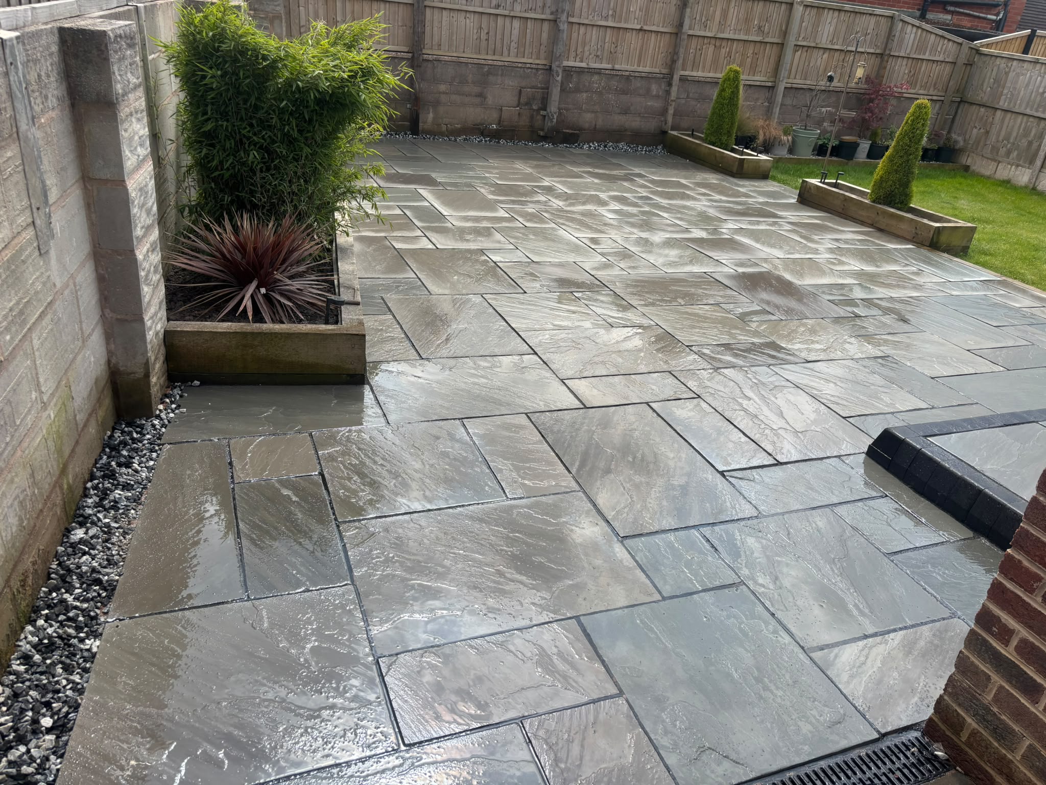 Natural sandstone patio installed by Stonecoat Driveways in Stoke-on-Trent
